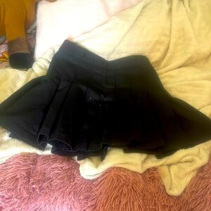 This is a black skirt I don’t know the size